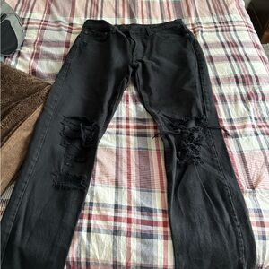Ripped Levi black jeans